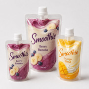 Smoothie spout pouch group with berry banana and mango blend packaging cues