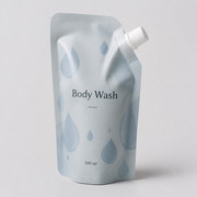 Matte body wash refill spout pouch with corner cap and 300 ml label