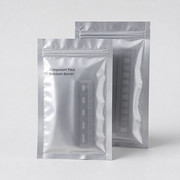 Two silver component moisture-barrier pouches with faint carrier tape silhouettes