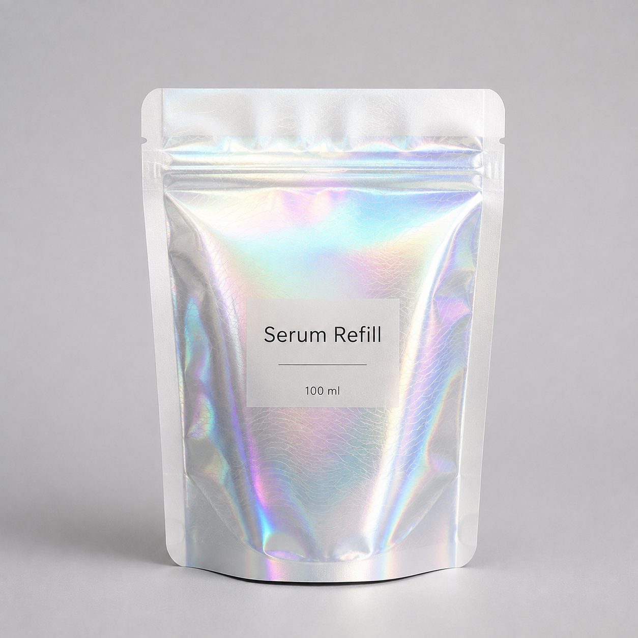 Serum refill stand-up pouch with holographic security film panel and generic 100 ml label