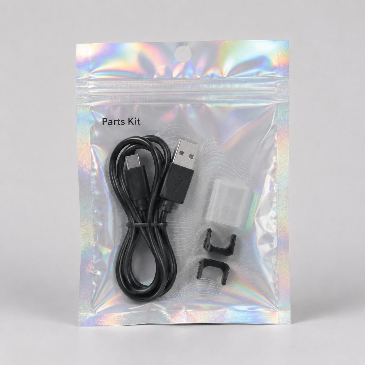 Parts kit clear-front holographic zipper pouch with plain cable and small components