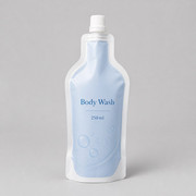 Bottle silhouette shaped pouch with spout and printable artwork panel