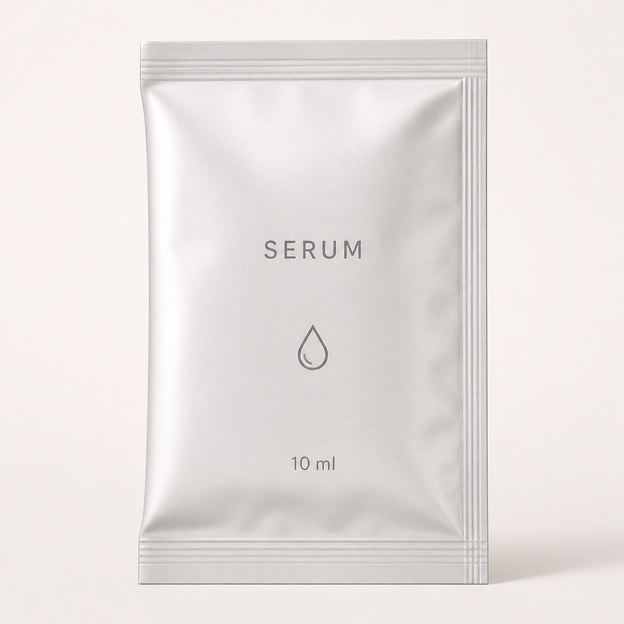 Pearl-white three-side-seal serum sachet with folded side and generic 10 ml print