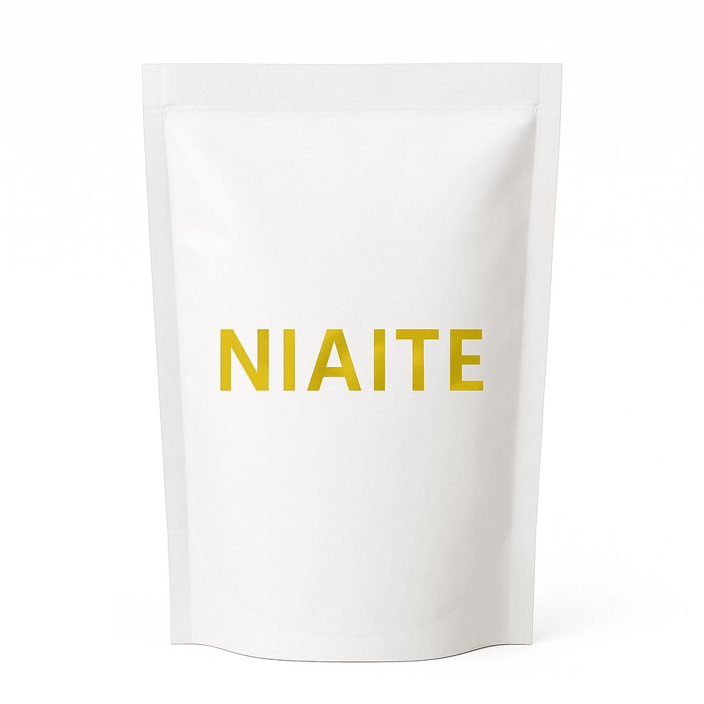 White NIAITE stand-up pouch sample showing bottom gusset and upright shelf stance