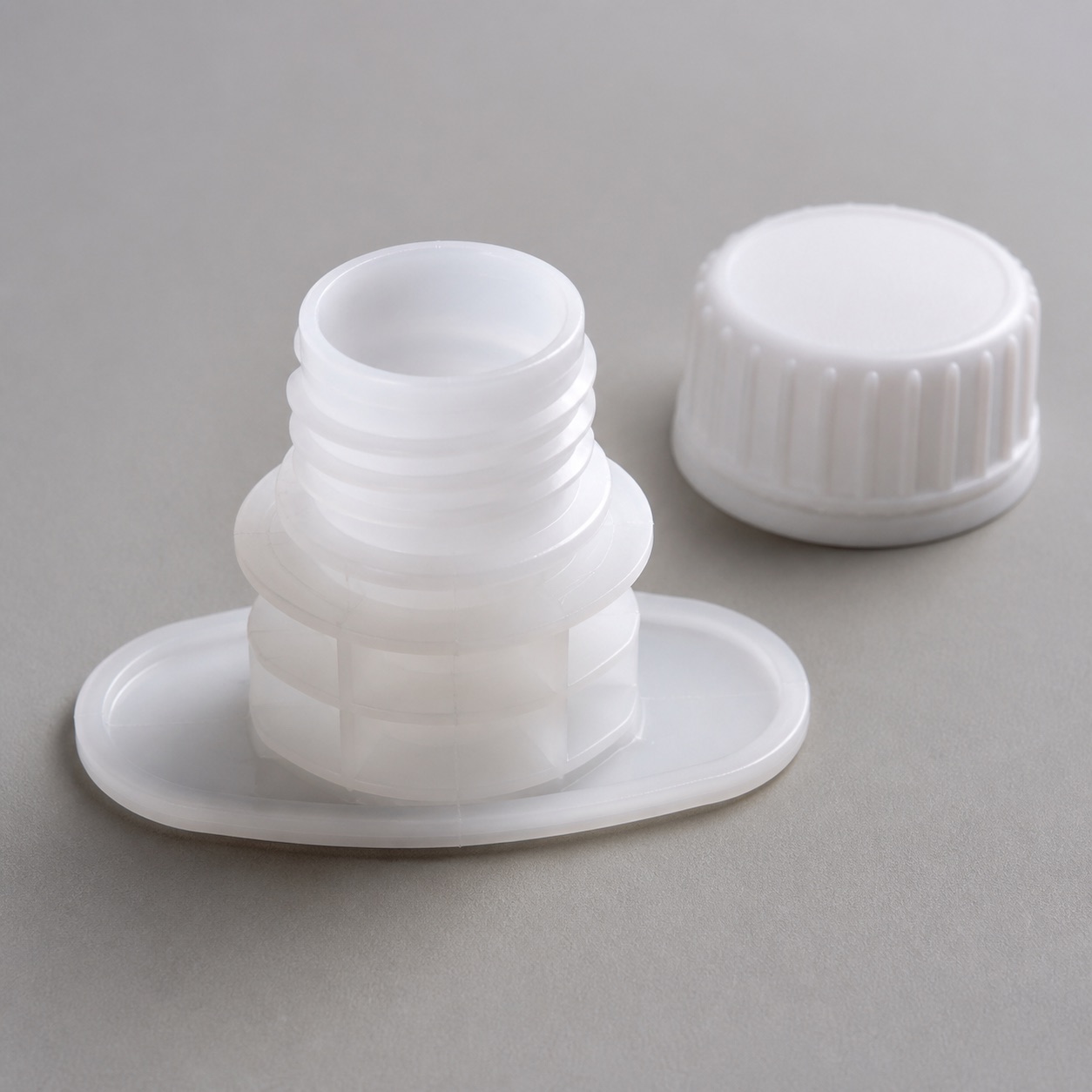 Top spout fitment component with matching cap for pouch closure review